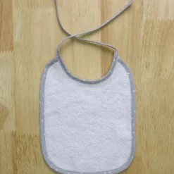 Babero rizo liso blanco/gris 25x30