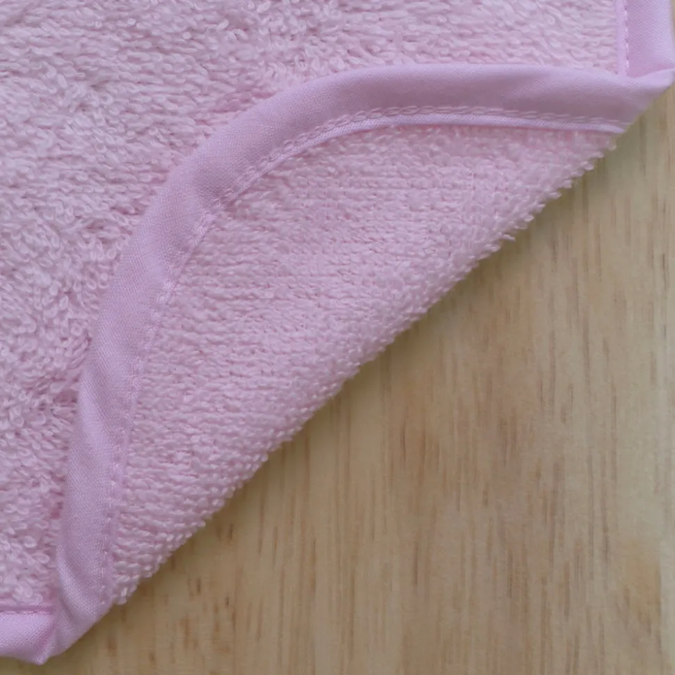 Babero rizo liso rosa 25x30