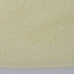 Babero rizo plastico con goma amarillo