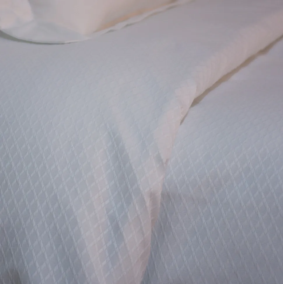 Colcha jacquard rombo blanca