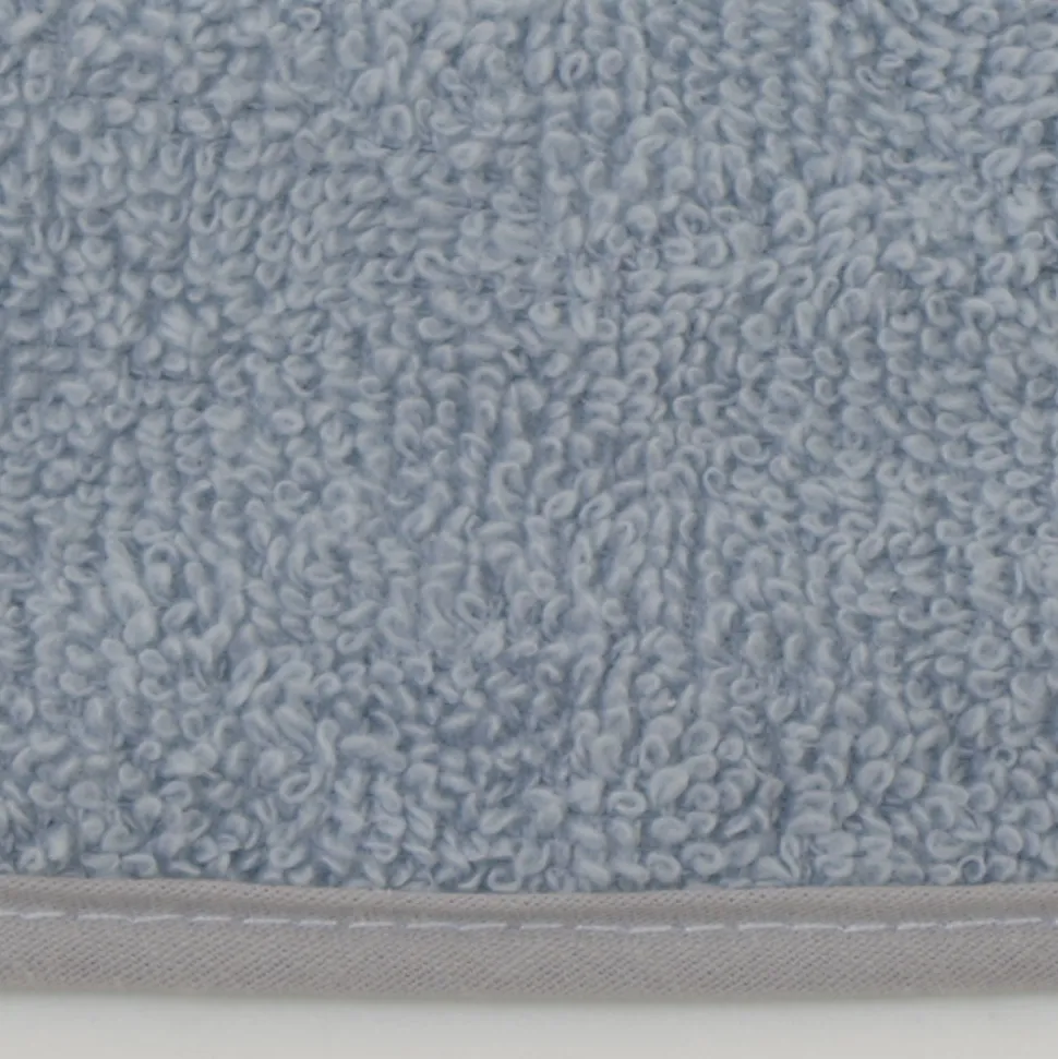 Pack 3 baberos rizo guardería color azul hielo con elástico. Lavables, exterior de rizo y reverso impermeable. Medidas: 33x29cm